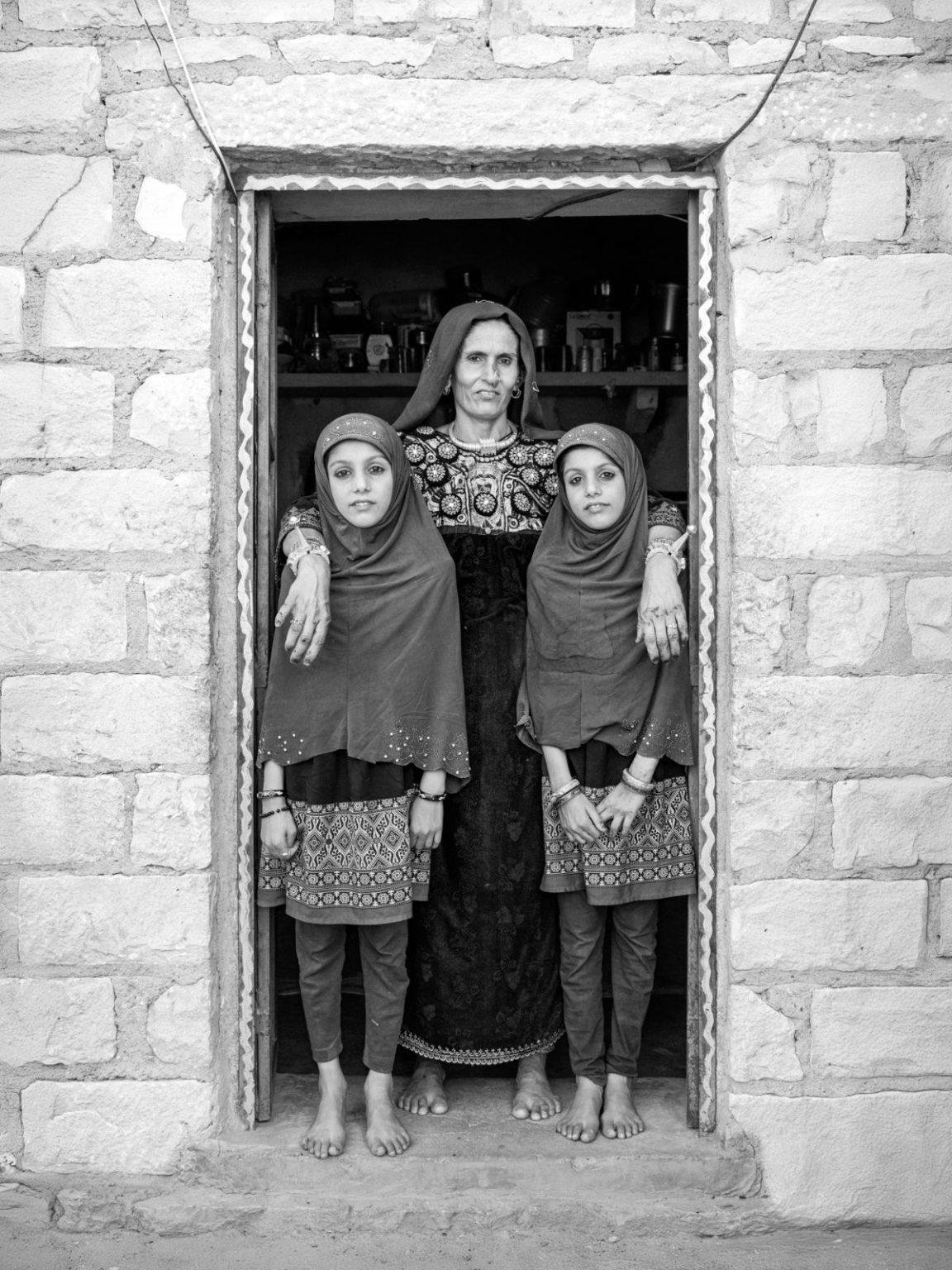 Haseena and Madina with mother Bachai Lakhmano, Rajasthan by Lina Bertucci