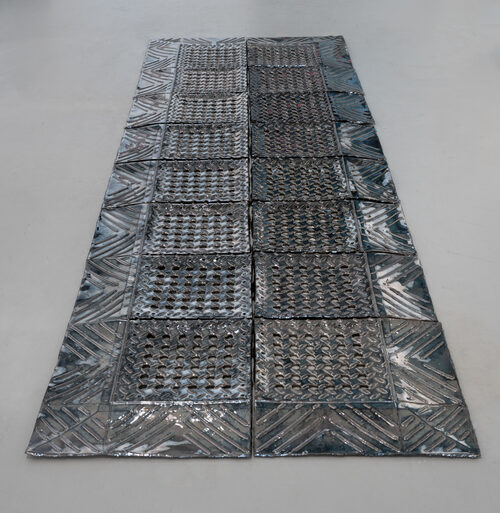 View featured artwork Diamond Flex-Lok industrial mat with holes by Abed Elmajid Shalabi