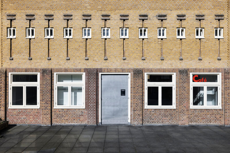 Four-Story, Flat-Roofed Complex in a Somewhat Expressionist Style