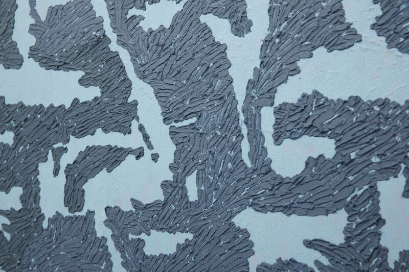 It splits off, gently lifting under the pull