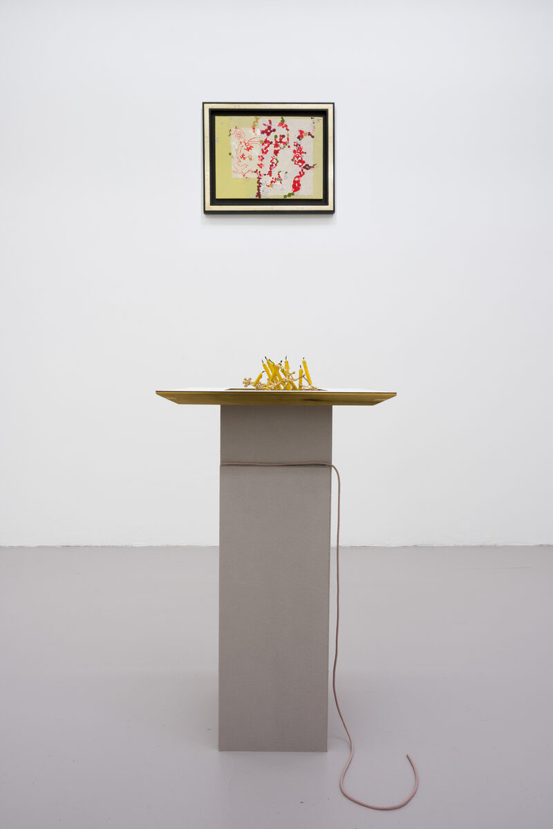 The candle is on the table